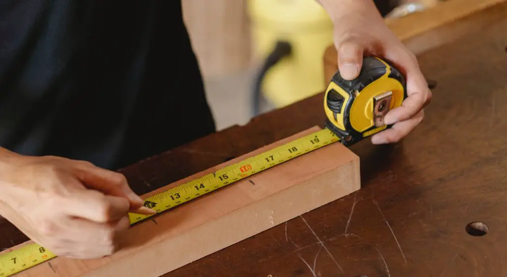 measuring essential tools for a beginner woodworker